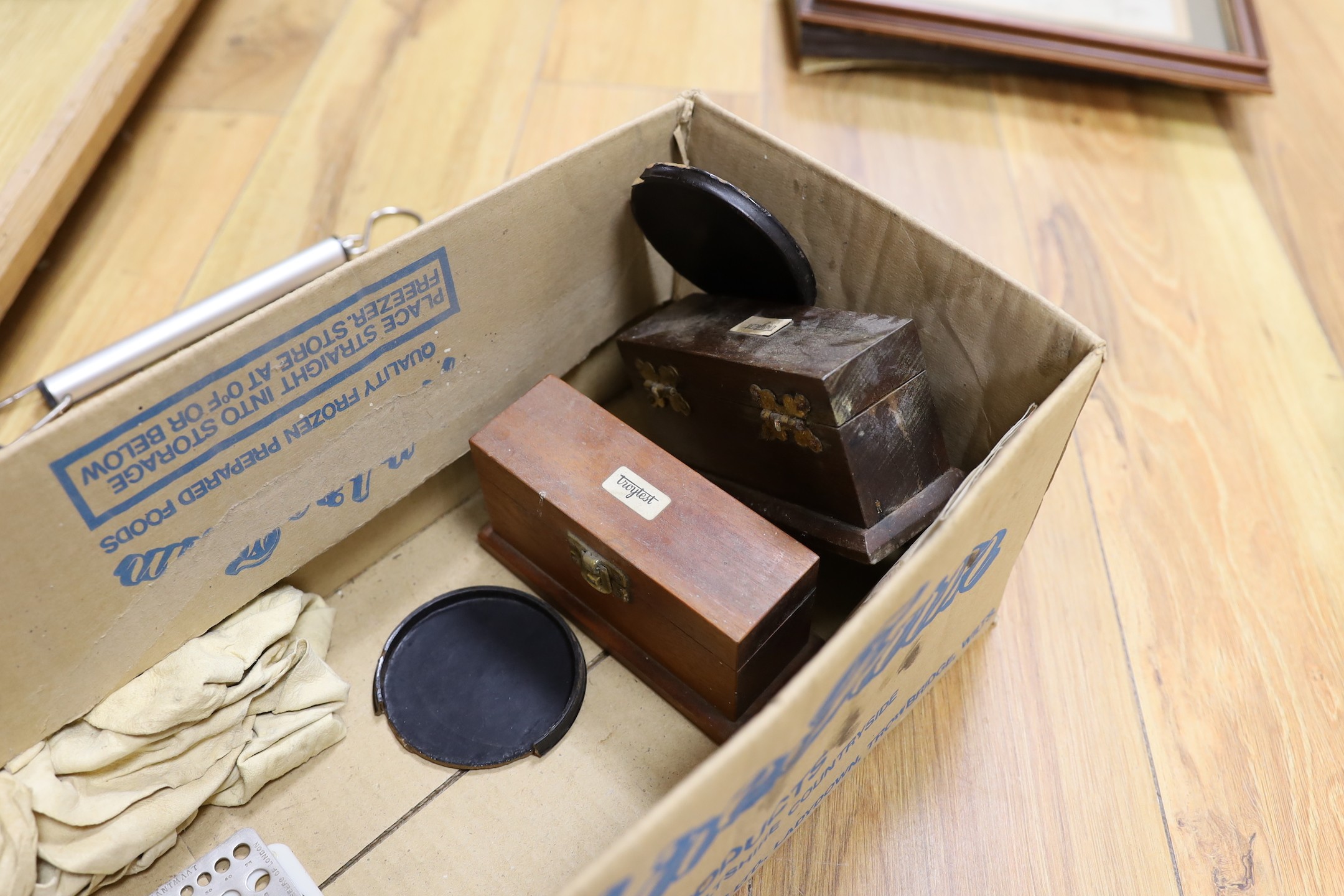 A quantity of various weighing scales, pots and prints